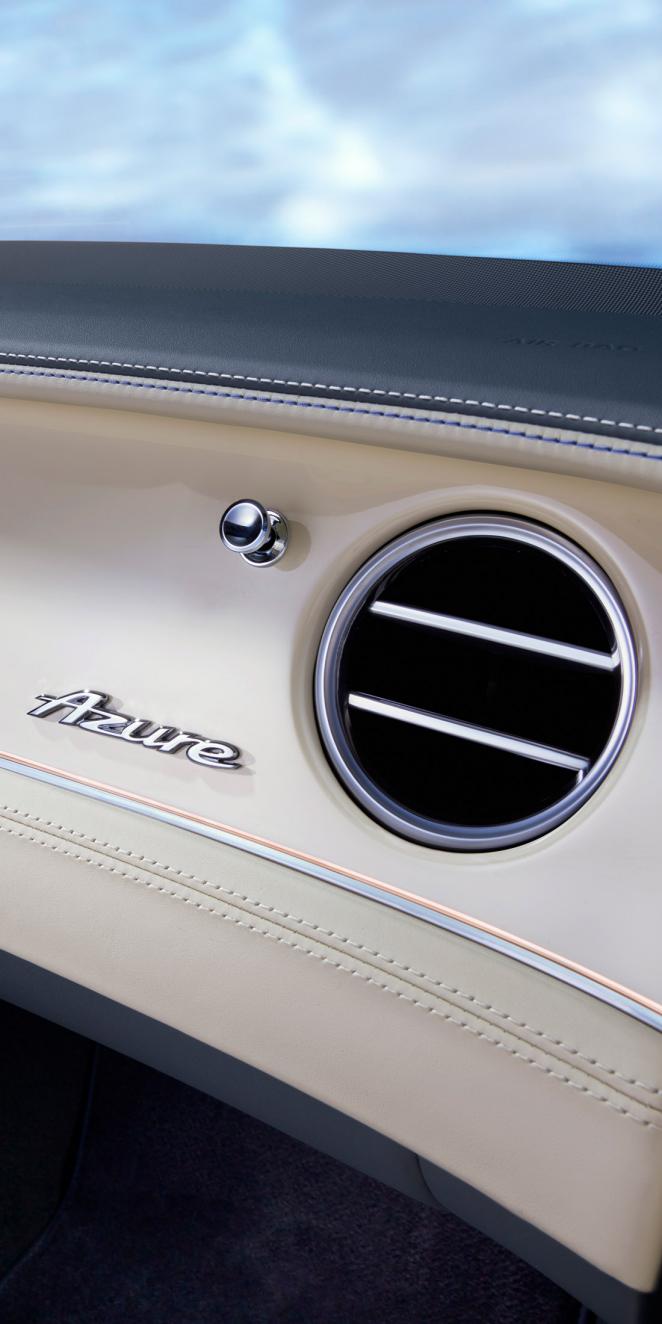 Close up of the new white piano veneer in the Continental GT Azure with a bullseye air conditioning vent