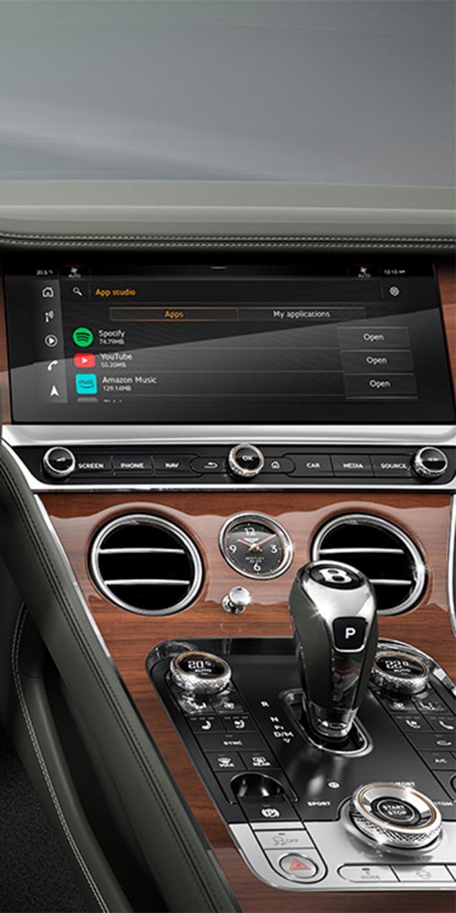 Close up of the MMI in the new hybrid Continental GT Convertible featuring Bentley App Studio