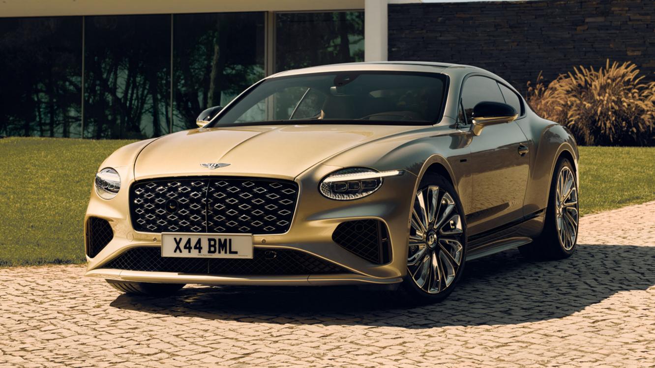 Front three quarter of the new hybrid Bentley Continental GT Mulliner with a Patina exterior colour and exclusive Mulliner 22" directional wheels