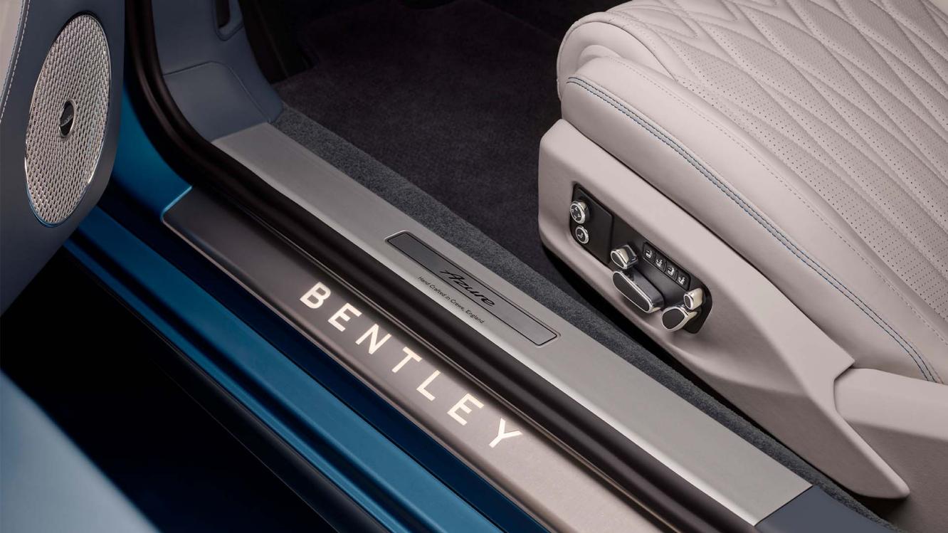Model sitting in the drivers seat of the new Bentley Continental GT Mulliner with linen main hide and Damson secondary hide