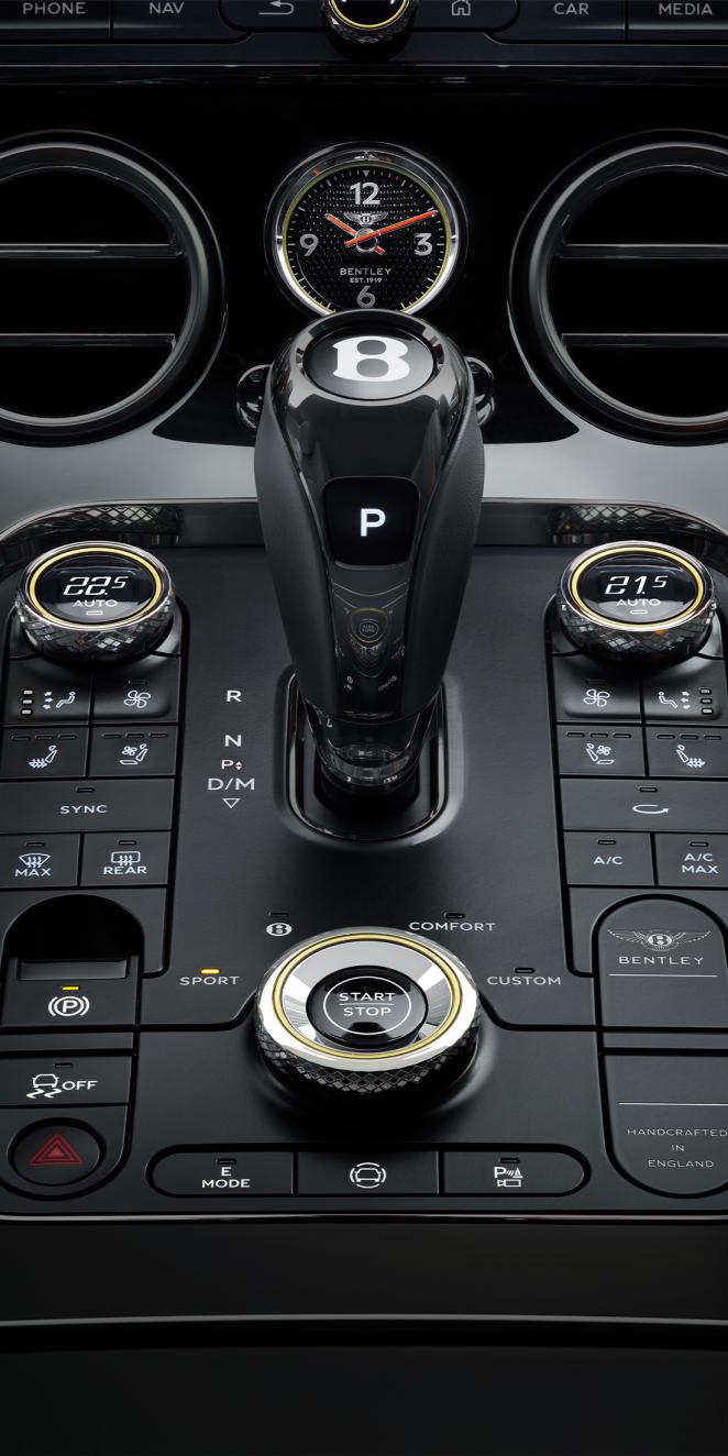 Close up of the driver controls and gear lever in the new Bentley Continental GTC Speed